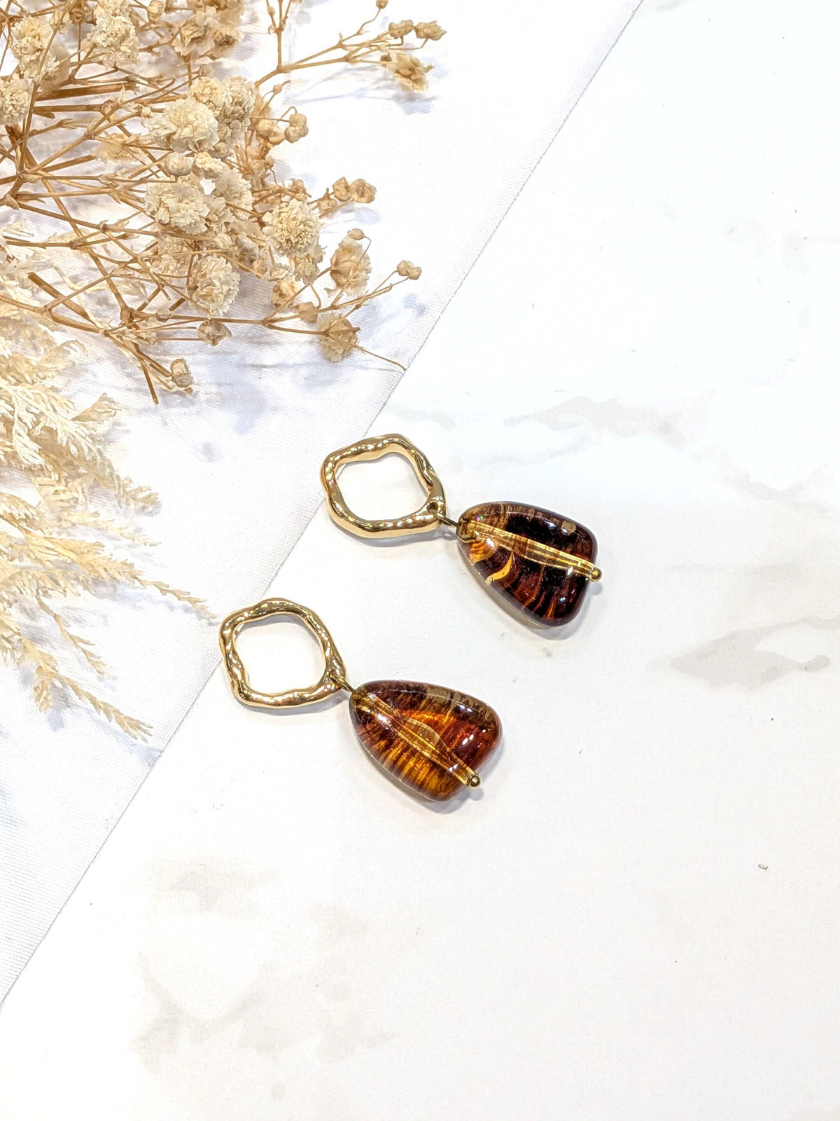 Boucle d'oreille Origine