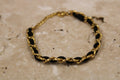 Bracelet chaîne dorée tressée noir